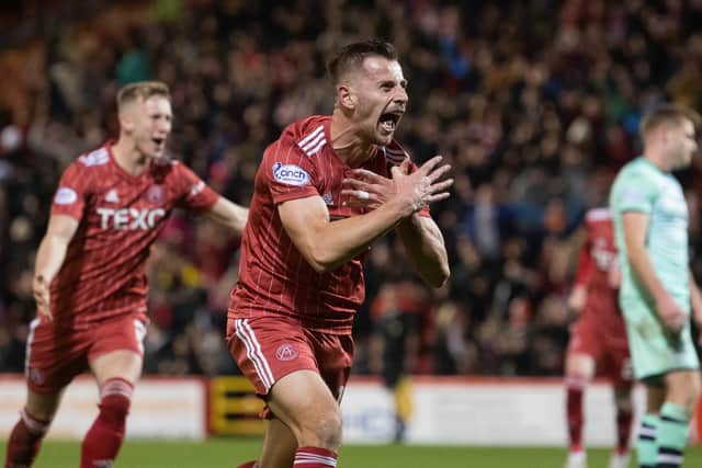 Ylber Ramadani celebrates after scoring Aberdeen's third against Hibs. (Photo by Craig Foy / SNS Group)
