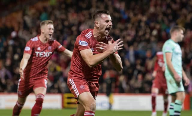 Ylber Ramadani celebrates after scoring Aberdeen's third against Hibs. (Photo by Craig Foy / SNS Group)