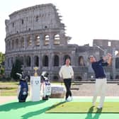 Team Captains Luke Donald of England and Zach Johnson of The United States pose for a photograph with the Ryder Cup Trophy at the Colosseum during the Ryder Cup 2023 Year to Go Media Event on October 04, 2022 in Rome.