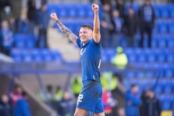 St. Johnstone's Callum Hendry celebrates towards the fans at full time after scoring a dramatic winner.  (Photo by Paul Devlin / SNS Group)