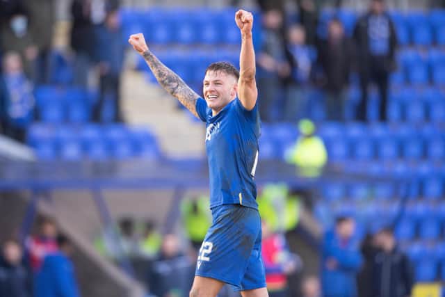 St. Johnstone's Callum Hendry celebrates towards the fans at full time after scoring a dramatic winner. (Photo by Paul Devlin / SNS Group)
