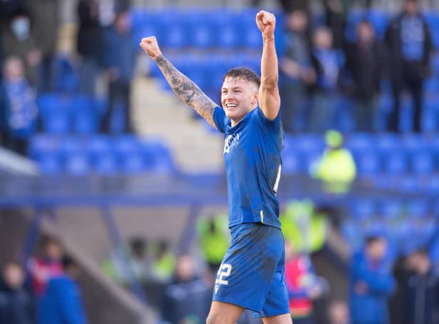 St. Johnstone's Callum Hendry celebrates towards the fans at full time after scoring a dramatic winner.  (Photo by Paul Devlin / SNS Group)