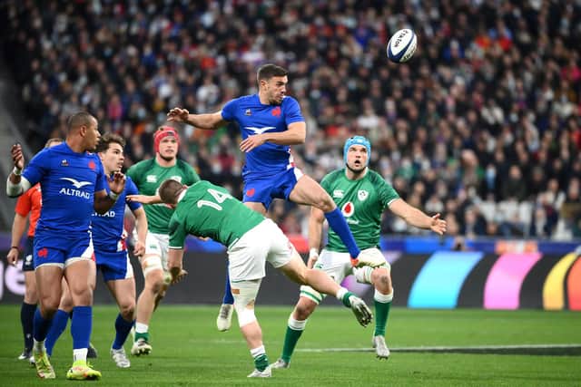 France's full-back Melvyn Jaminet fights to catch the ball during the Six Nations rugby union international match between France and Ireland at the Stade de France.
