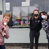 Nicola Sturgeon takes a selfie while having an ice cream in Ayr during campaigning for the Scottish Parliament election (Picture: Russell Cheyne/PA)