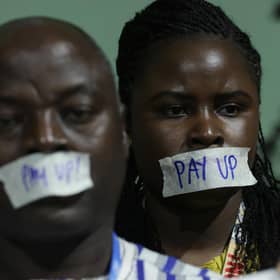 Activists demanding that rich countries pay up for climate finance for developing countries of the Global South protest at COP29 (Picture: Sean Gallup/Getty Images)