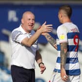 Queens Park Rangers' Lyndon Dykes with manager Mark Warburton during the Sky Bet Championship match at The Kiyan Prince Foundation Stadium, London. Photo: Bradley Collyer/PA Wire.