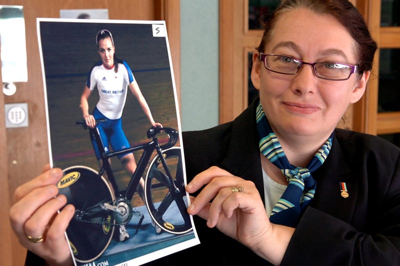 Staff at the Newcastle Building Society, on York Road were running a "Guess the Sportsperson" competition to see if customers could identify GB Olympic stars. Pictured is customer advisor Michelle Sherwood with a picture of Victoria Pendleton.