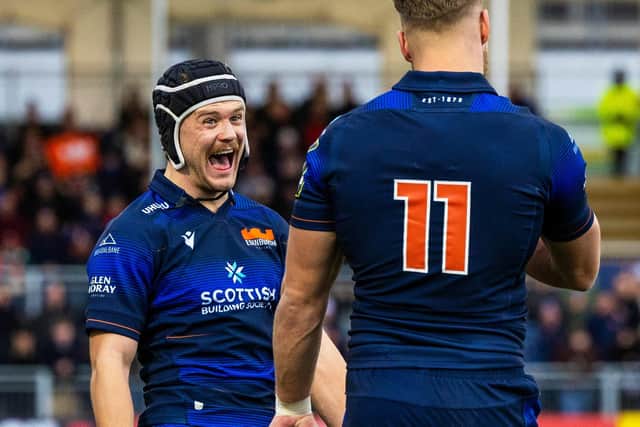 Darcy Graham, left, celebrates with Duhan van der Merwe after the latter's second try in the 34-21 win over Castres in the EPCR Challenge Cup.  (Photo by Ross Parker / SNS Group)