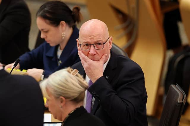 First Minister John Swinney has complained that the UK Government's digital ID scheme is an attempt to 'force Scots to be British' (Picture: Jeff J Mitchell/Getty Images)