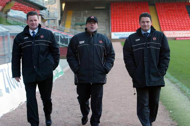 Docherty, right, arrives at Tannadice to take a look around alongside the then new manager Ian McCall, centre, and Gordon Chisholm, left.