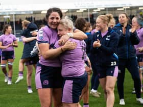 Christine Belisle and Lana Skeldon celebrate Scotland's win over Italy.