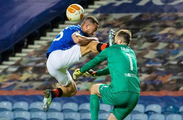 Kemar Roofe's challenge on Slavia Prague goalkeeper Ondrej Kolar which saw the Rangers forward sent off just six minutes after coming on as a substitute. (Photo by Alan Harvey / SNS Group)