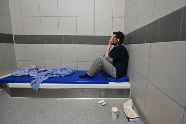 A young man at Oldbury custody suite in a cell. Picture: John Devlin/JPIMedia