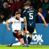 Aberdeen captain Graeme Shinnie received a red card for this late challenge on Jack Baldwin following a VAR check in the 1-0 win over Ross County.  (Photo by Mark Scates / SNS Group)