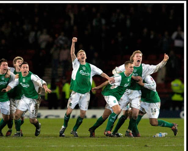 Hibs players -including Stephen Dobbie, second from left - celebrate their penalty shoot-out victory over Rangers in the 2004 League Cup semi-final ... Pic Donald MacLeod 05.02.04