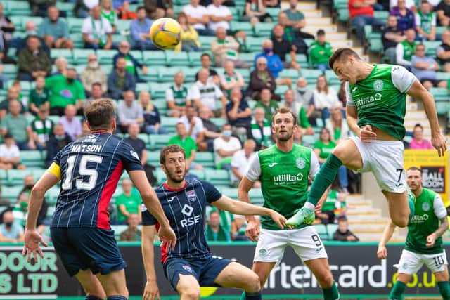 Kyle Magennis heads Hibs into a 2-0 lead against Ross County.