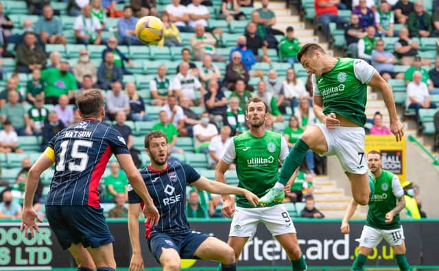 Kyle Magennis heads Hibs into a 2-0 lead against Ross County.