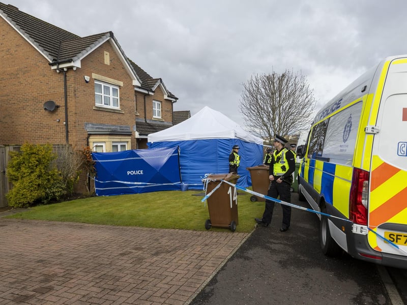 Officers from Police Scotland outside the home of former chief executive of the Scottish National Party (SNP) Peter Murrell, in Uddingston, Glasgow, after he was "released without charge pending further investigation", after he was arrested on Wednesday as part of a probe into the party's finances
