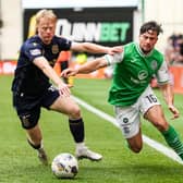 Hibs' Lewis Stevenson tries to get past Dundee's Lyall Cameron during the 0-0 draw at Easter Road.