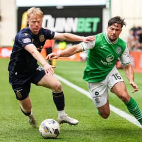 Hibs' Lewis Stevenson tries to get past Dundee's Lyall Cameron during the 0-0 draw at Easter Road.