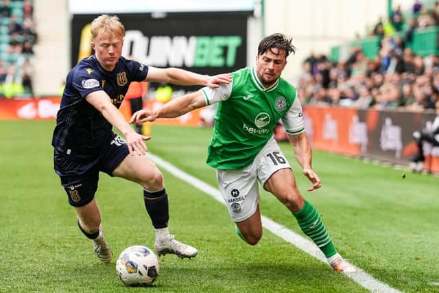 Hibs' Lewis Stevenson tries to get past Dundee's Lyall Cameron during the 0-0 draw at Easter Road.