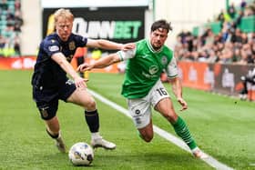 Hibs' Lewis Stevenson tries to get past Dundee's Lyall Cameron during the 0-0 draw at Easter Road.