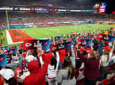 Fans hold up signs in the stands during Super Bowl LV between the Tampa Bay Buccaneers and the Kansas City Chiefs at Raymond James Stadium on 7 February 2021. (Pic: Getty Images)