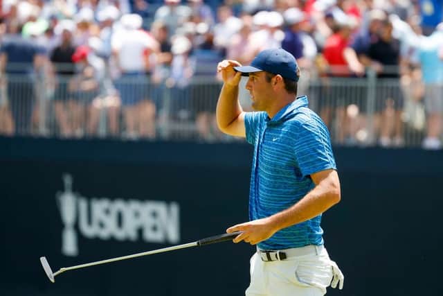 Scottie Scheffler acknowledges the crowd on the 18th green during the second round of the 122nd US Open in Boston. Picture: Jared C. Tilton/Getty Images.