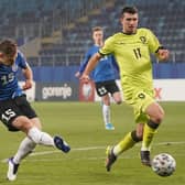 Estonia's forward Rauno Sappinen shoots past Czech Republic's defender Ondrej Kudela to score during the FIFA World Cup Qatar 2022 qualification Group E football match between Estonia and Czech Republic at the Lublin Stadium, in Lublin, Poland on March 24, 2021. (Photo by JANEK SKARZYNSKI/AFP via Getty Images)