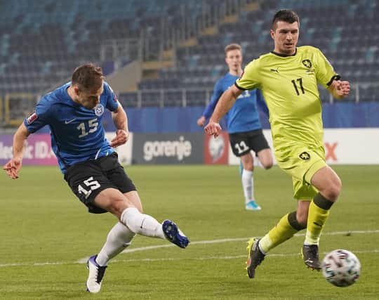 Estonia's forward Rauno Sappinen shoots past Czech Republic's defender Ondrej Kudela to score during the FIFA World Cup Qatar 2022 qualification Group E football match between Estonia and Czech Republic at the Lublin Stadium, in Lublin, Poland on March 24, 2021. (Photo by JANEK SKARZYNSKI/AFP via Getty Images)