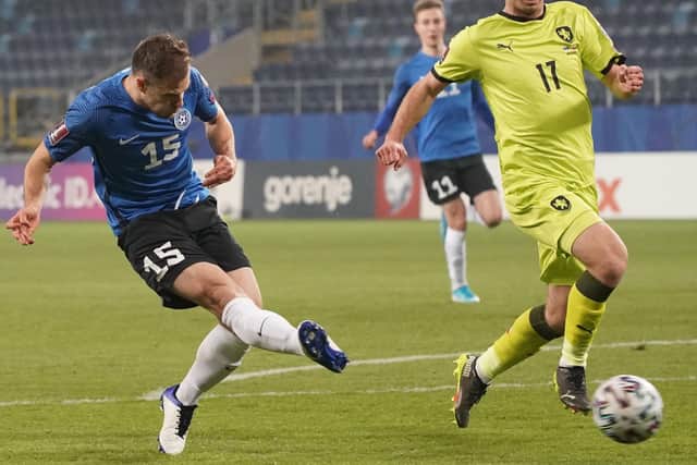 Estonia's forward Rauno Sappinen shoots past Czech Republic's defender Ondrej Kudela to score during the FIFA World Cup Qatar 2022 qualification Group E football match between Estonia and Czech Republic at the Lublin Stadium, in Lublin, Poland on March 24, 2021. (Photo by JANEK SKARZYNSKI/AFP via Getty Images)