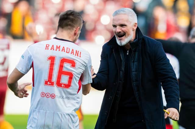 Aberdeen manager Jim Goodwin celebrates with Ylber Ramadani at full-time following the 2-1 win over Motherwell at Fir Park. (Photo by Craig Foy / SNS Group)