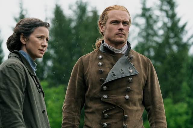 Sam Heughan as Jamie Fraser, with Caitriona Balfe as Claire, in season seven of Outlander, 2023. Pic: Starz! Movie Channel/Everett/Shutterstock