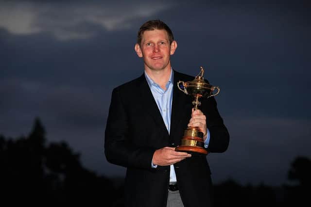 Stephen Gallacher poses with the Ryder Cup after being part of a winning team under Paul McGinley at Gleneagles in 2014. Picture: Jamie Squire/Getty Images.