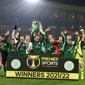 Celtic’s David Turnbull  lifts the Premier Sports Cup Trophy as Celtic celebrate. (Photo by Alan Harvey / SNS Group)