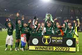 Celtic’s David Turnbull  lifts the Premier Sports Cup Trophy as Celtic celebrate. (Photo by Alan Harvey / SNS Group)
