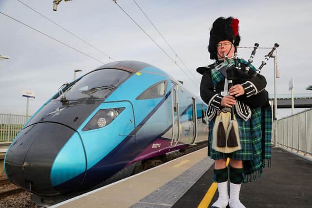 Sandy Mutch, the Border Piper, welcomes in the 6.16am TransPennine Express service to Reston Station, the first passenger service to stop in the village for more than 50 years. (Picture: Jason Lock)