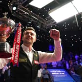 Mark Selby parades the trophy after winning the Betfred World Snooker Championships, defeating Shaun Murphy in the final. Picture: Zac Goodwin/PA Wire