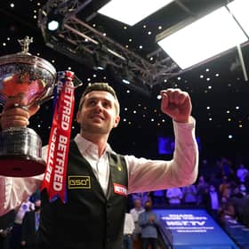Mark Selby parades the trophy after winning the Betfred World Snooker Championships, defeating Shaun Murphy in the final. Picture: Zac Goodwin/PA Wire