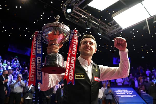 Mark Selby parades the trophy after winning the Betfred World Snooker Championships, defeating Shaun Murphy in the final. Picture: Zac Goodwin/PA Wire