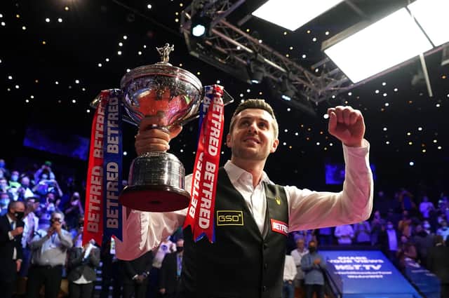 Mark Selby parades the trophy after winning the Betfred World Snooker Championships, defeating Shaun Murphy in the final. Picture: Zac Goodwin/PA Wire