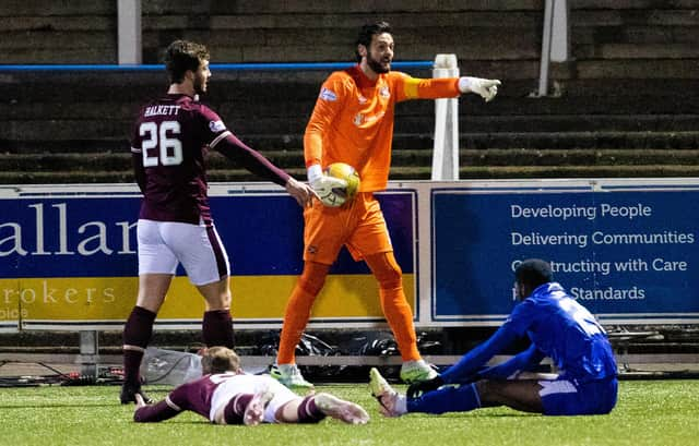 Craig Gordon was unhappy with the award of a penalty. Picture: SNS