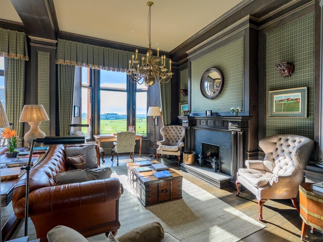 Interior The apartment’s open-plan living and kitchen space has a south-facing window, and features a fireplace with an Adam-style mantel. The Kohler kitchen boasts a breakfast bar and Belfast sink, while the principal bedroom suite couples a jacuzzi bath with a dressing area.