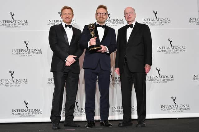 Kevin McKidd presenting Kenneth Branagh with his award for best performance by an actor in Wallander, and Bruce Paisner, at the International Emmy Awards in New York, 2017  (Pic: Dia Dipasupil/Getty Images)