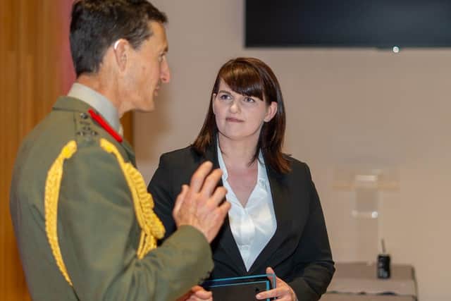 Brigadier Andy Muddiman and Stephanie Grieve, Associate Director Scullion LAW.