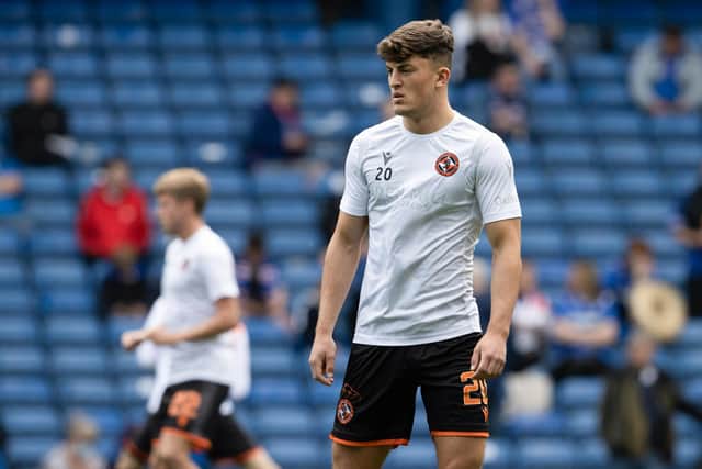 Hearts have signed Dundee United's Lewis Neilson.