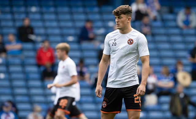 Hearts have signed Dundee United's Lewis Neilson.