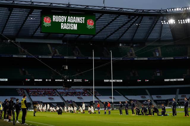 Some players stand and others take the knee ahead of the Six Nations between England and Scotland at Twickenham. Picture: Adrian Dennis/AFP via Getty Images