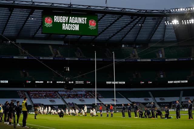 Some players stand and others take the knee ahead of the Six Nations between England and Scotland at Twickenham. Picture: Adrian Dennis/AFP via Getty Images