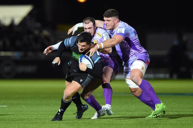 Glasgow Warriors' Sam Johnson is tackled by Exeter's Stuart Hogg during last season's Champions Cup match at Scotstoun which finished 31-31. Picture: Paul Devlin/SNS